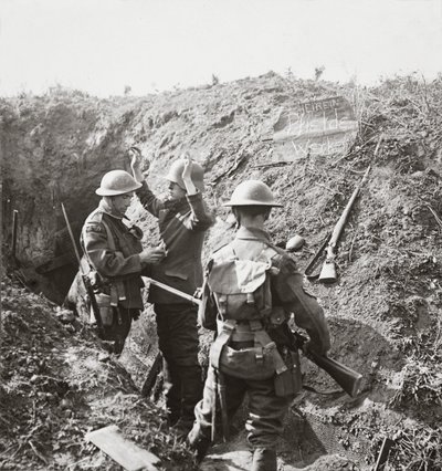 Examining a Jerry prisoner to obtain information which enables us to anticipate an enemy attack by English Photographer